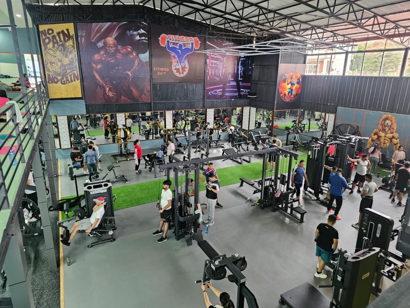 Fitness 24x7 gym floor with strength-training equipment